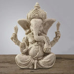 statue ganesha décorative asiatique résine sculptée beige clair blanc cassé fleurs roses plantes vertes