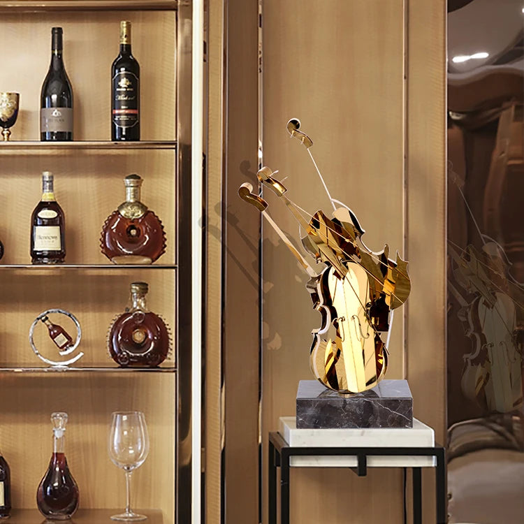sculpture moderne abstraite violon dorée métal brillant décoration intérieure luxe chambre salon marbre noir