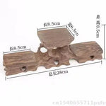 support plante bois sculpté artisanal marron foncé pot fleurs décoration végétale rustic stand