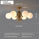 lustre élégant or feuilles stylisées 68cm diamètre 32cm hauteur ampoules e14