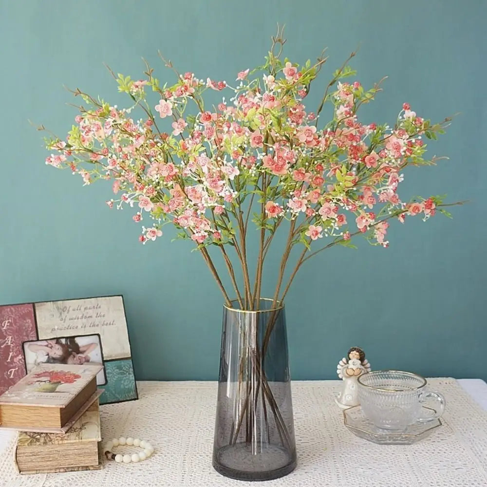 décoration intérieure fleurs artificielles soie rose blanc jaune vert branches feuilles vases transparents printemps