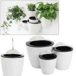 pots suspendus résine blanc noir modernes mur fleur verte chambre jardin