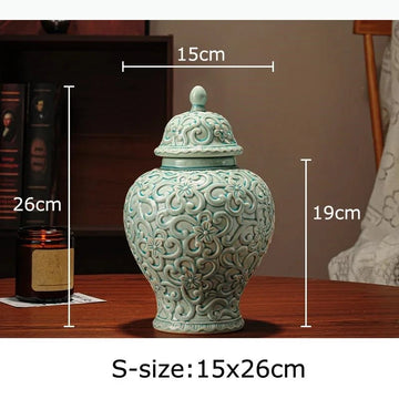 pot décoratif doré ornements floraux couvercle classique table arrangement floral moderne