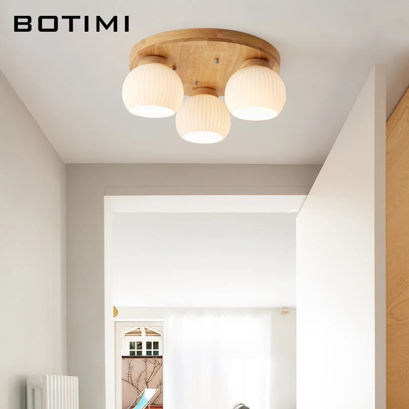 lampe moderne bois blanc abat jour verre motifs plissés éclairage chambre coucher