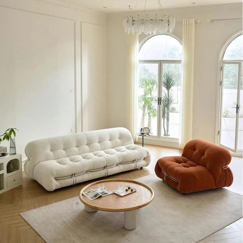 canapé convertible moderne tissu bouclé bois coussins doux beige clair minimaliste éléments scandinaves salon
