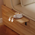 canapé lit extensible canapé moderne simili cuir beige clair coussins tablette intégrée tapis