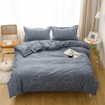 ensemble literie moderne noir blanc motif géométrique housse couette oreillers polyester