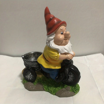 décoration jardin gnome moto rouge veste jaune pantalon bleu barbe blanche fleurs jaunes