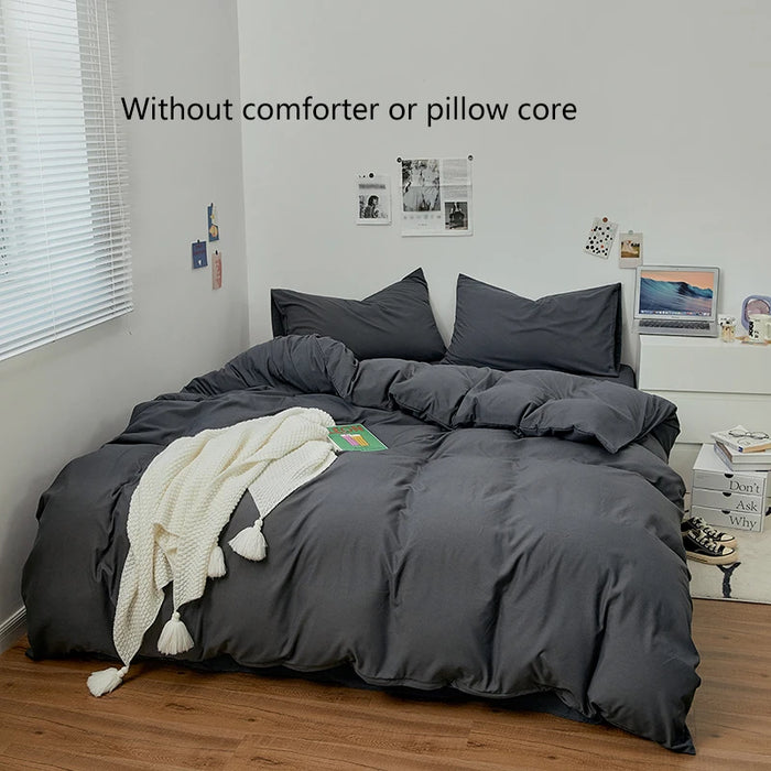 Parure de lit minimaliste 3 pièces couleur unie sur un lit