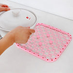 tapis drainage évier carré moderne rose grille cercles clips magnétiques respectueux environnement silicone