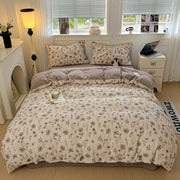 ensemble literie floral motif texturé taies oreiller drap housse couette beige marron gris intérieur
