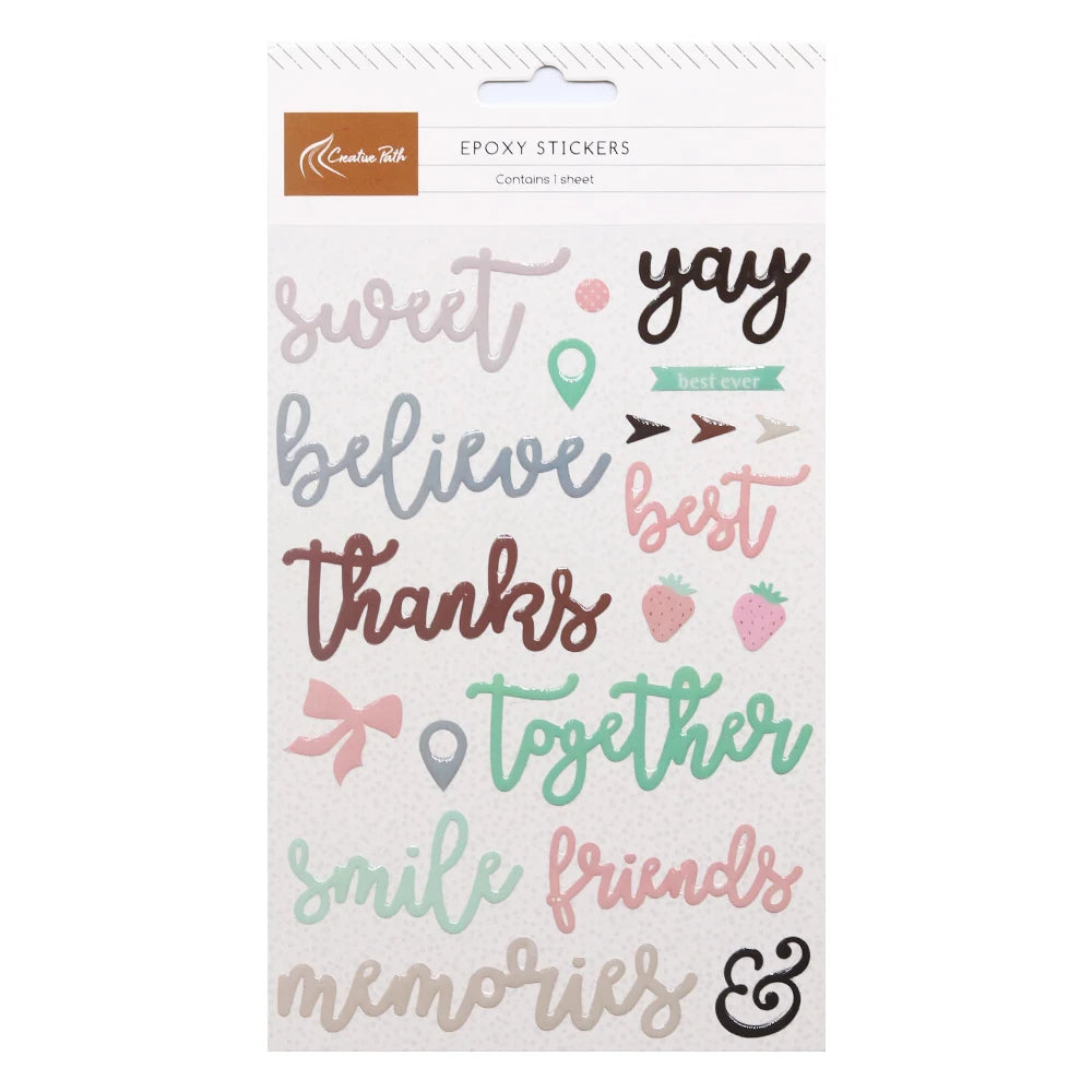 sticker epoxy violet bleu clair rose vert lettres stylisées fraises points decoration écriture fluide