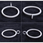 Anneau blanc polyvalent avec crochet intégré pour fixation, présenté sur fond noir. Accessoire pratique pour divers usages domestiques ou professionnels, offrant solidité et design épuré. Idéal pour organiser et maintenir différents objets en toute simplicité.