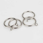 Anneaux ronds pour rideaux, lot de quatre pièces, finition élégante, parfaits pour une installation facile et une décoration moderne de la maison. Accessoires durables adaptés à tout type de tringle, idéaux pour personnaliser l'intérieur avec style.