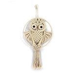 Décoration murale en forme de hibou artisanale, idéale pour ajouter une touche bohème à votre intérieur. Élément de décoration unique et accrocheur pour les amateurs de style naturel et créatif.