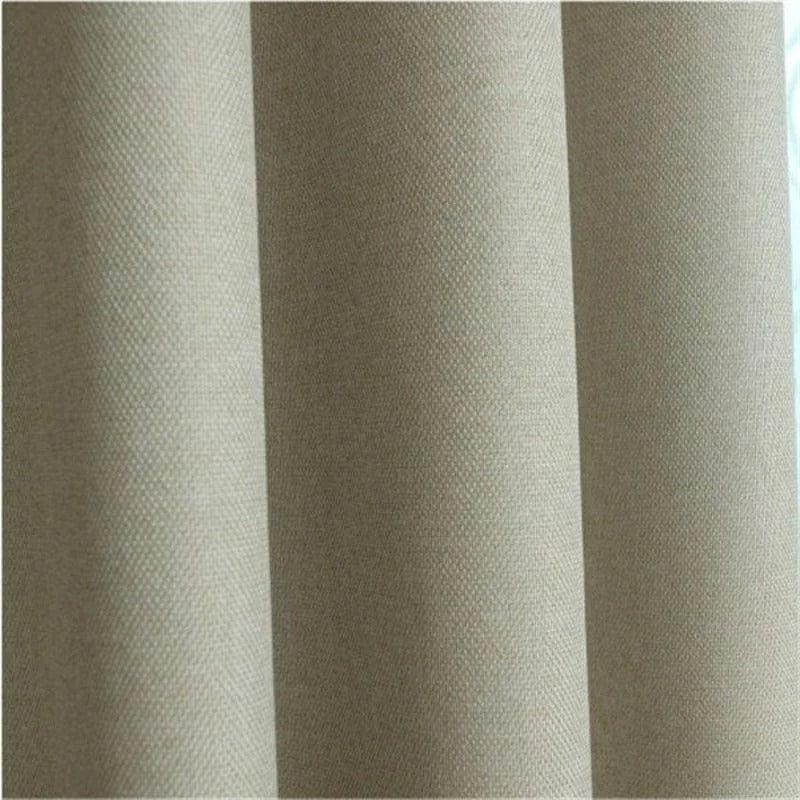Rideau beige élégant pour salon moderne, offrant une ambiance chaleureuse et épurée avec une texture subtile. Idéal pour apporter une touche de sophistication à votre décoration intérieure tout en préservant votre intimité.