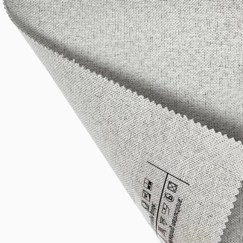 Tissu gris multifonction idéal pour la couture et la décoration intérieure, offrant durabilité et qualité supérieure. Conçu pour répondre aux besoins de divers projets textiles, avec instructions d'entretien visibles. Parfait pour des créations originales et des rénovations élégantes.