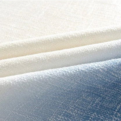 Image de tissu en bleu et blanc, idéal pour la confection de vêtements ou de décorations intérieures, offrant un aspect élégant et moderne pour diverses applications.