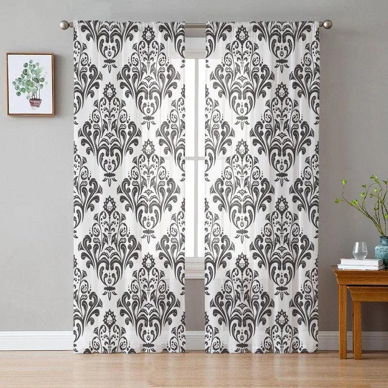 Rideau élégant à motifs floraux et géométriques en noir et blanc, idéal pour décorer un salon moderne. Ce rideau rehausse l'ambiance de votre intérieur avec son design raffiné et contemporain. Parfait pour ajouter une touche de sophistication à n'importe quelle pièce de votre maison.