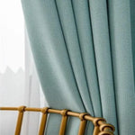 Rideau opaque bleu-vert élégant pour salon, style moderne et épuré, parfait pour la décoration intérieure, accentue la lumière naturelle, idéal pour créer une ambiance apaisante et sophistiquée dans votre espace de vie.