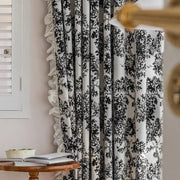 rideau contemporain motif paysage noir fond blanc franges volants élégant intérieur classique