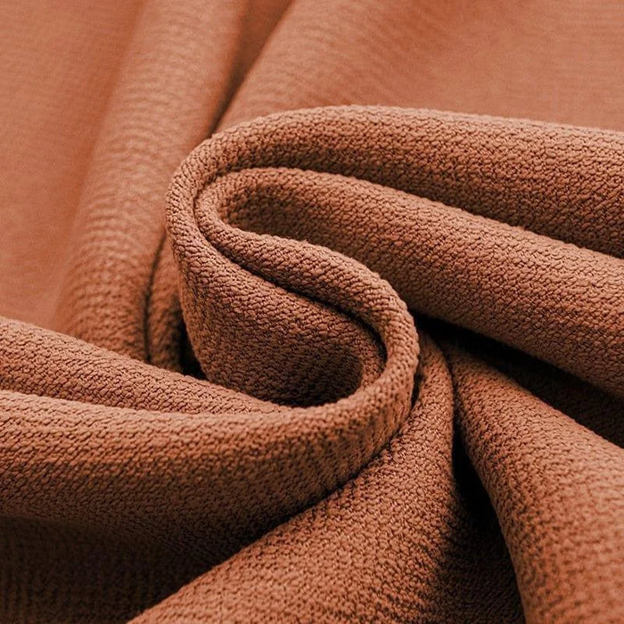 Tissu de couleur marron avec texture détaillée, parfait pour confectionner des vêtements élégants et confortables. Design moderne adapté à la décoration intérieure et renforçant le charme de tout espace de vie. Idéal pour les projets de couture créatifs.