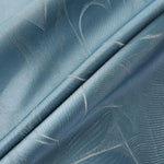 Tissu bleu élégant avec motifs subtils pour décoration intérieure ou confection de vêtements. Idéal pour apporter une touche de sophistication et de modernité à vos projets textiles. Parfait pour la création de rideaux, de nappes ou de vêtements élégants.