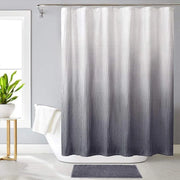rideau douche texturé dégradé blanc gris moderne opacité variable tringle métal tapis serviette plante