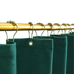 Tringle à rideaux élégante avec rideaux vert foncé et crochets décoratifs dorés, idéale pour ajouter une touche moderne et chic à votre intérieur. Solution pratique et stylée pour habiller vos fenêtres avec raffinement. Parfaite pour le salon, la chambre à coucher ou toute autre pièce de la maison.