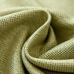 Tissu texturé beige pour décoration intérieure, idéal pour canapés, rideaux et projets de couture sur mesure, offrant une touche élégante et moderne à tout espace de vie. Parfait pour les amateurs de design à la recherche de qualité et de style.