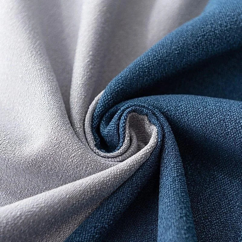 Texture élégante de tissu bicolore bleu et gris, idéale pour la décoration intérieure moderne et chic.