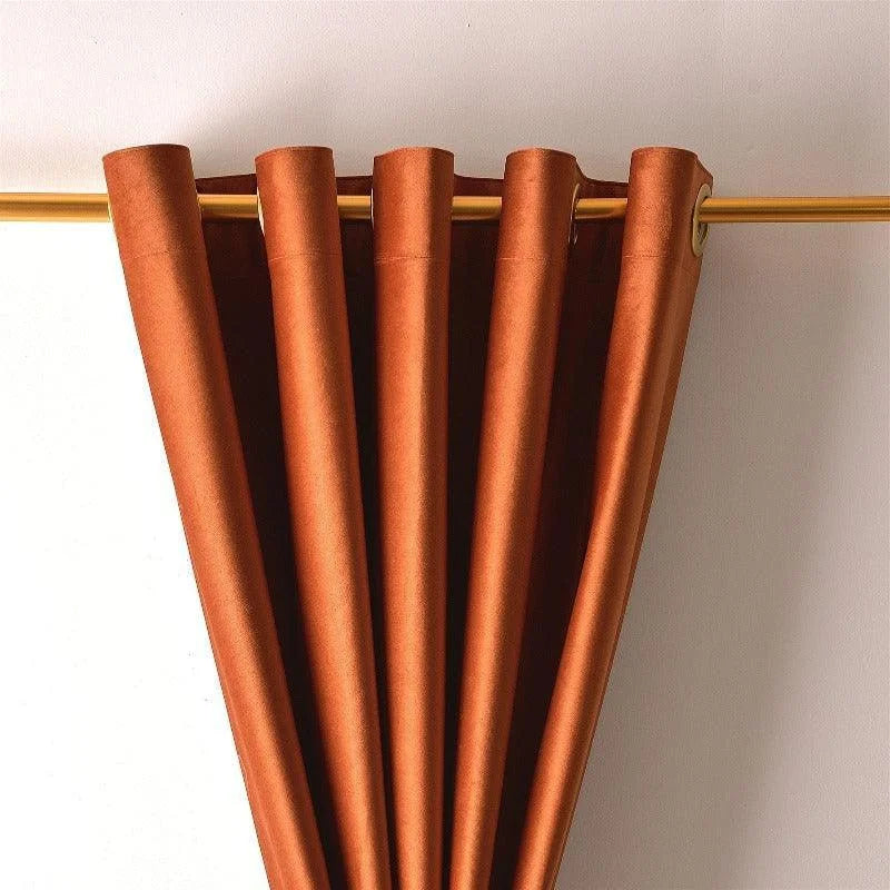 Rideau moderne couleur terre cuite avec œillets dorés, parfait pour ajouter une touche chaleureuse et élégante à votre décoration intérieure. Idéal pour le salon, la chambre ou toute autre pièce nécessitant une atmosphère accueillante et sophistiquée.