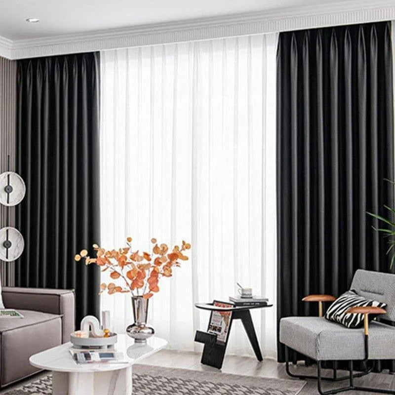 Rideaux élégants noirs pour salon moderne, apportant une ambiance chic et contemporaine à votre intérieur. Idéaux pour créer une atmosphère chaleureuse et intime dans votre espace de vie. Découvrez comment ces rideaux peuvent transformer votre décoration avec style.