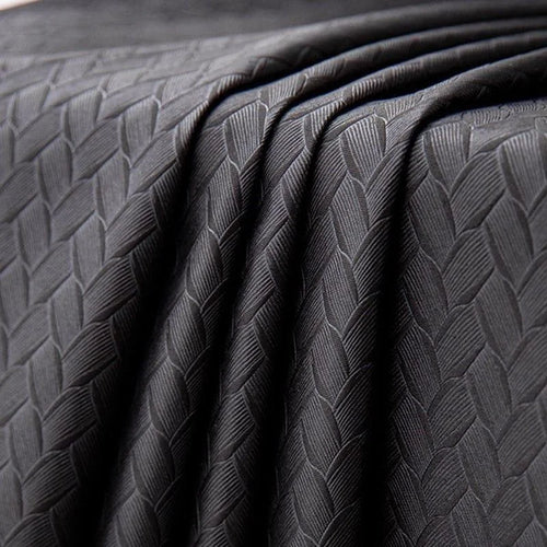 Texture élégante et moderne avec un motif géométrique en relief, idéale pour la décoration intérieure et la confection de vêtements tendance. Cette image met en avant un design raffiné et intemporel, parfait pour apporter une touche de sophistication à votre intérieur.