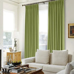 Rideaux verts élégants pour salon moderne, parfaits pour ajouter une touche de couleur fraîche et lumineuse. Idéal pour créer une ambiance accueillante, ces rideaux s'accordent harmonieusement avec un mobilier clair et une décoration contemporaine. Accessoire décoratif pour optimiser l'esthétique et l'intimité de votre espace de vie.