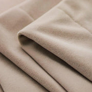 rideau polyester beige clair texture veloutée opacité totale classique élégant tringle fenetre plante verte
