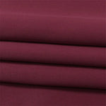 Image d'un tissu de couleur bordeaux, idéal pour des créations textiles élégantes et modernes. Ce matériau offre une couleur riche et profonde, parfaite pour des projets de décoration intérieure ou de confection vestimentaire. Sa teinte bordeaux s'harmonise facilement avec divers styles et s'intègre parfaitement dans des ambiances chaleureuses et sophistiquées.