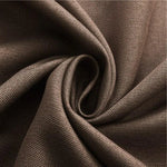 Plan rapproché d'un tissu brun élégant avec un motif tissé serré, idéal pour la confection de vêtements ou la décoration intérieure. Ce textile raffiné se distingue par sa texture et sa douceur, offrant un style sophistiqué et intemporel. Parfait pour les amateurs de mode et de design recherchant une qualité supérieure.