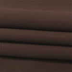 Image d'un tissu brun plié, idéal pour la confection de vêtements et d'accessoires textiles. Parfait pour des projets créatifs ou des usages décoratifs, offrant une jolie teinte de marron.