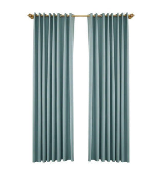Rideaux élégants bleu canard pour salon, avec une fixation élégante, idéaux pour une décoration intérieure moderne et sophistiquée. Ces rideaux offrent une touche de couleur apaisante et une finition raffinée pour transformer votre espace de vie.