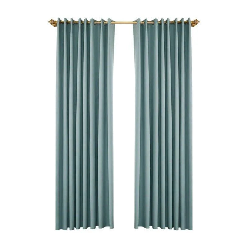 Rideaux élégants bleu canard pour salon, avec une fixation élégante, idéaux pour une décoration intérieure moderne et sophistiquée. Ces rideaux offrent une touche de couleur apaisante et une finition raffinée pour transformer votre espace de vie.