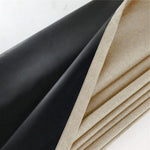 Tissu noir et beige plié, idéal pour la couture et la décoration intérieure, mise en valeur des deux teintes élégantes pour un style moderne et sophistiqué.