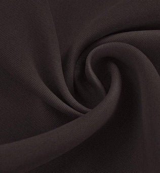 Tissu de couleur noire élégante, parfait pour la confection de vêtements sur mesure. Ce textile polyvalent offre une sensation de luxe, idéal pour des créations à la mode, qu'il s'agisse de robes, de costumes ou de tenues de soirée.
