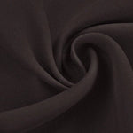 Tissu de couleur noire élégante, parfait pour la confection de vêtements sur mesure. Ce textile polyvalent offre une sensation de luxe, idéal pour des créations à la mode, qu'il s'agisse de robes, de costumes ou de tenues de soirée.