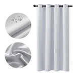 Rideau isolant thermique blanc avec œillets, idéal pour chambre ou salon. Offre protection contre la lumière et régulation thermique. Design moderne et élégant pour une décoration intérieure harmonieuse. Facile à installer et à entretenir. Convient à tout type de fenêtre.