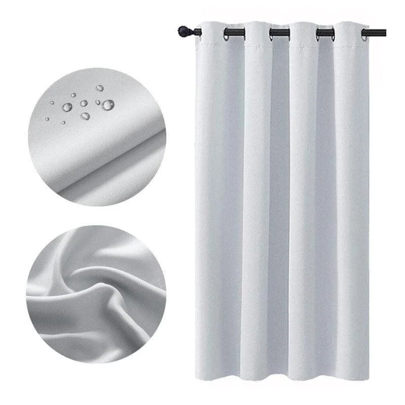 Rideau isolant thermique blanc avec œillets, idéal pour chambre ou salon. Offre protection contre la lumière et régulation thermique. Design moderne et élégant pour une décoration intérieure harmonieuse. Facile à installer et à entretenir. Convient à tout type de fenêtre.