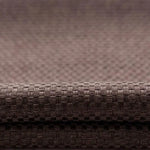 Texture tissu brun avec motif tissé en relief. Ce tissu élégant convient parfaitement pour la décoration d'intérieur, offrant un aspect chaleureux et moderne. Idéal pour la confection de rideaux, nappes ou coussins, ajoutant une touche sophistiquée à votre espace de vie.