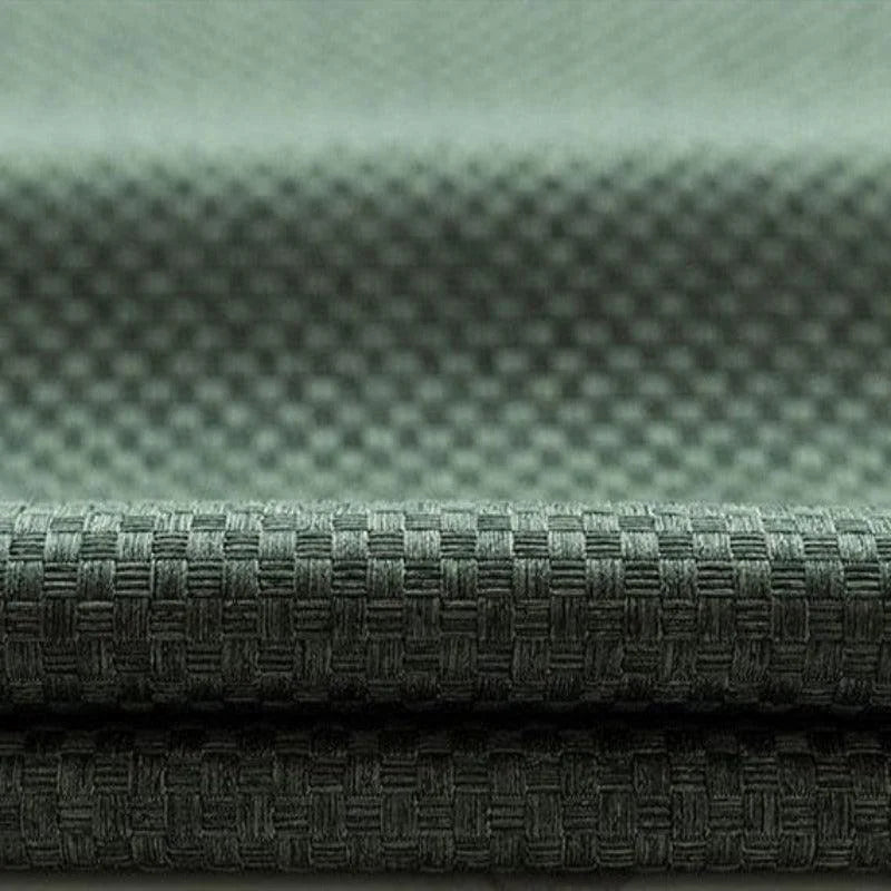 Texture tissée verte de qualité supérieure, idéale pour décoration intérieure et mode, offrant un style élégant et moderne grâce à son design géométrique distingué.