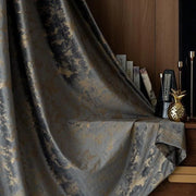 rideau gris doré motifs floraux texture brillante opacité élevée luxueux pince métallique dorée