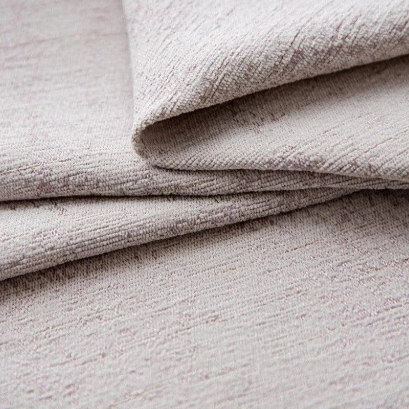 Tissu élégant de couleur beige, parfait pour la décoration intérieure. Doux au toucher, il est idéal pour la confection de rideaux, de housses de coussin ou de meubles. Apporte une touche sophistiquée à tout espace de vie. Qualité supérieure et finition soignée. Transforme votre intérieur avec style et élégance.